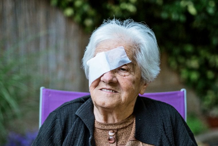 an elderly woman with macular degeneration