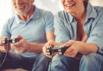 older couple playing video games