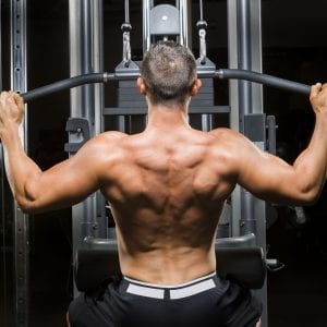 a man exercising his back