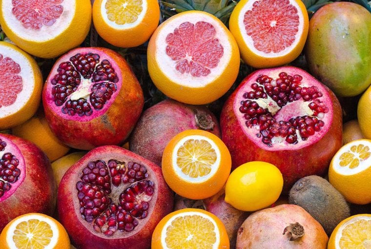 an assortment of citrus fruits