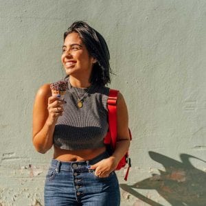 a woman eating a snack