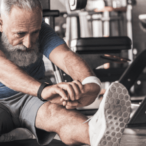 an older man stretching