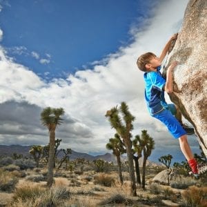 a child rock climbing