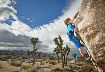 a child rock climbing