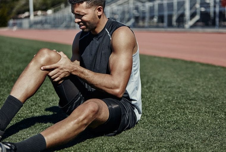 a man with sore muscles