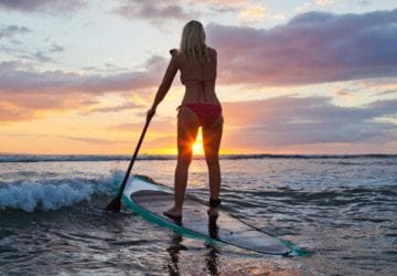 a woman on a SUP paddleboard