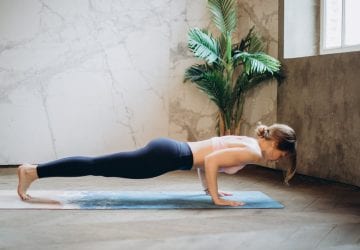 a woman doing planks