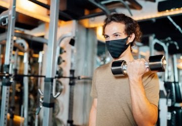 a man working out with a mask