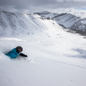 skiing outdoors in the mountains