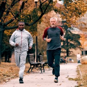 a pair of men going for a run