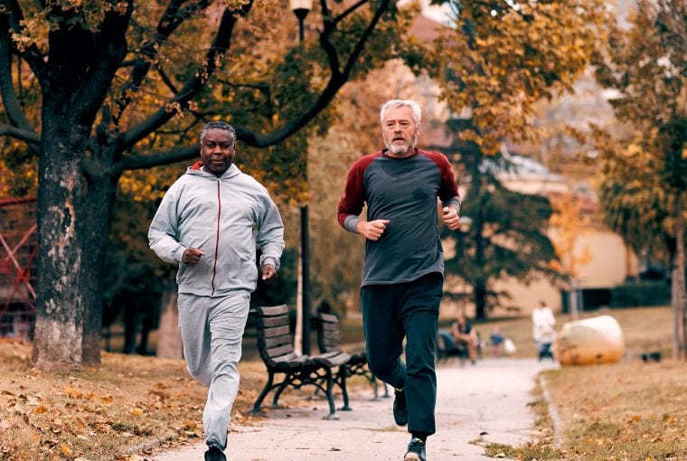 a pair of men going for a run