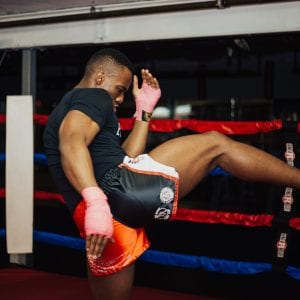 a man kickboxing