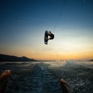 a person wakeboarding on the lake