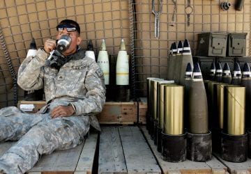 a soldier drinking coffee