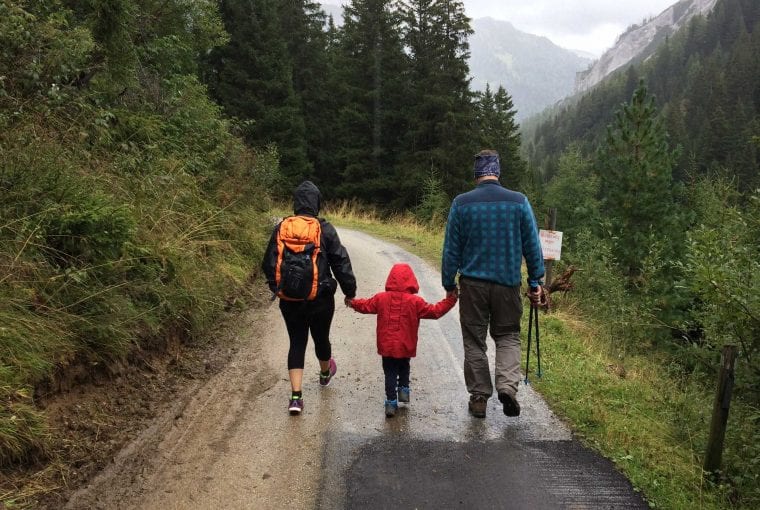a family walking outdoors