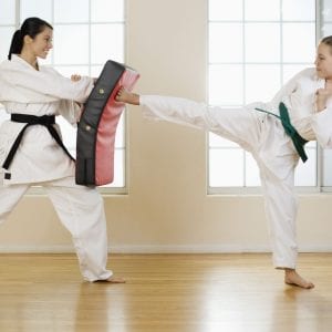 a couple doing martial arts