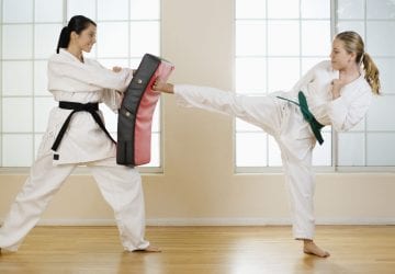 a couple doing martial arts