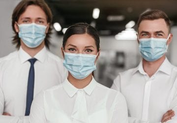 a group of masked medical professionals