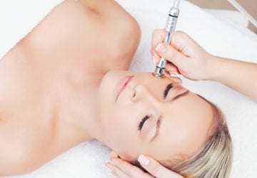 a woman receiving a spa treatment