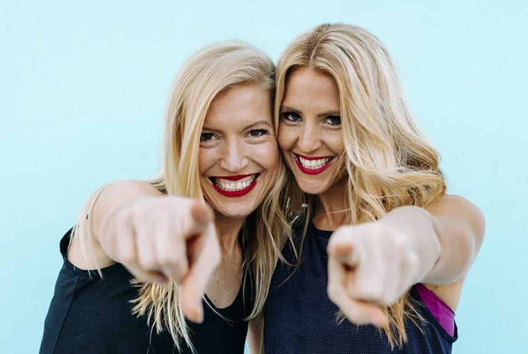 a couple healthy women pointing at the camera
