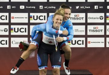 a pair of cyclists celebrating