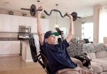 a man exercising with a spinal cord injury