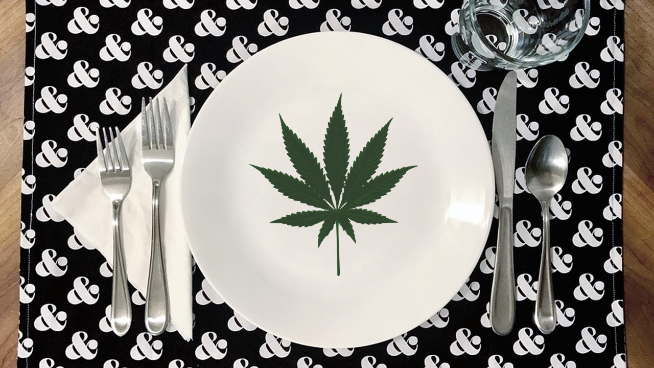 a cannibis leaf on a plate