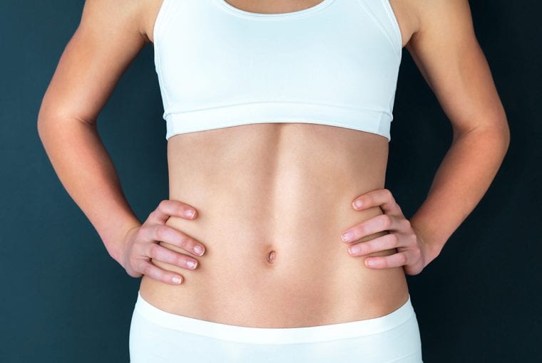 a woman with a toned core