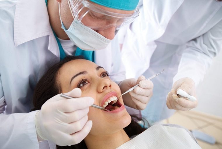 a woman getting dental work