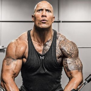 dwayne johnson flexing for the camera