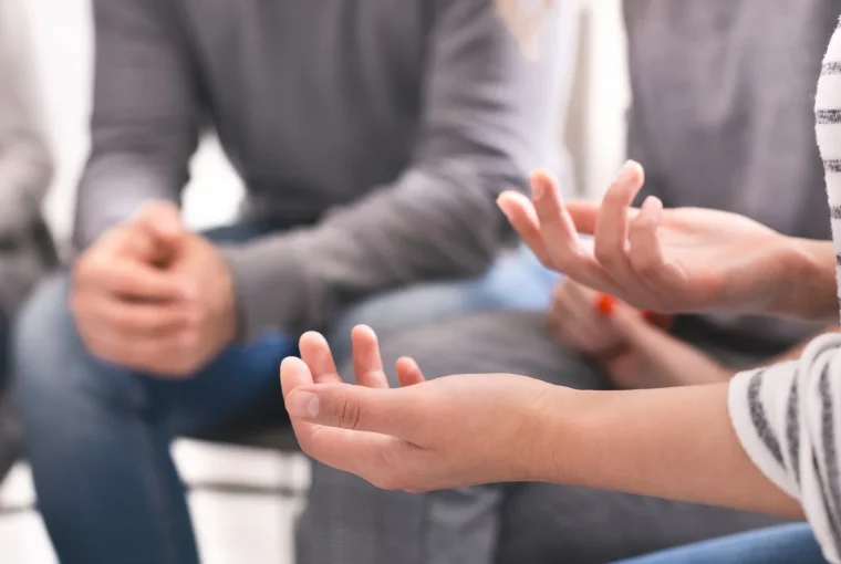 a couple talking in counselling