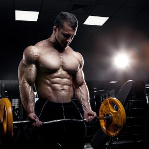 a man doing arm curls