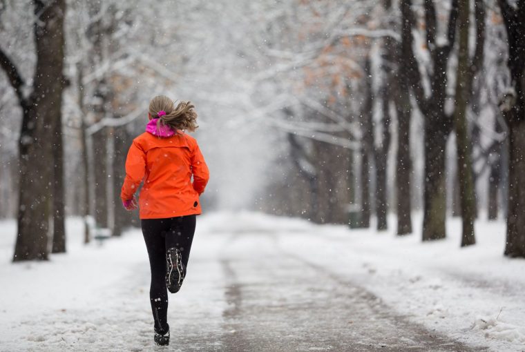 a woman running outdoors