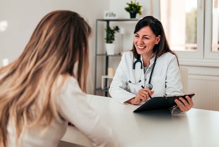 a doctor speaking with a patient