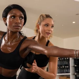 a woman working out with her trainer