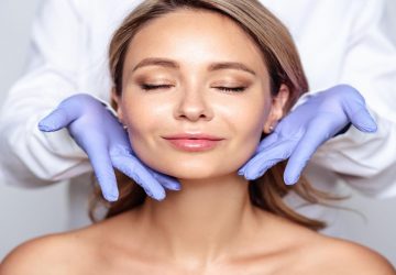 a woman getting a facial treatment