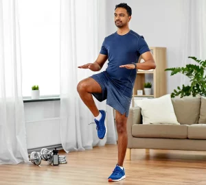 a man working out in his living room