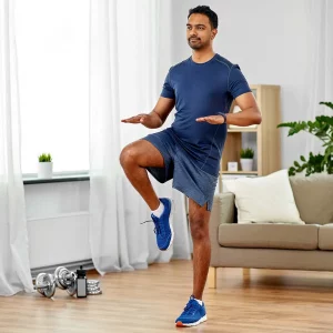 a man working out in his living room