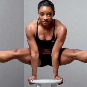 a woman doing the splits