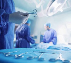 a group of surgeons in an operating room