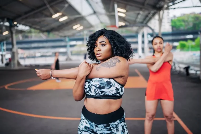 women exercising outdoors