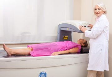 a woman getting a bone density test
