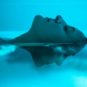 a woman in a float tank