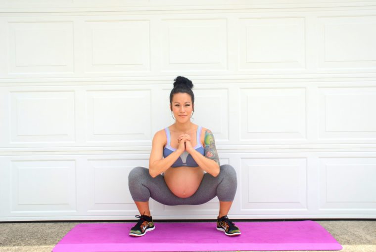 a pregnant woman exercising
