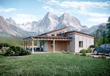 a gorgeous house set against a mountain background