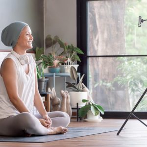 a woman looking at a circular light