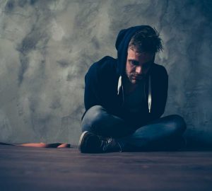 a man suffering from withdrawl