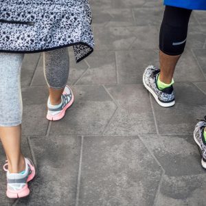 a pair of friends walking