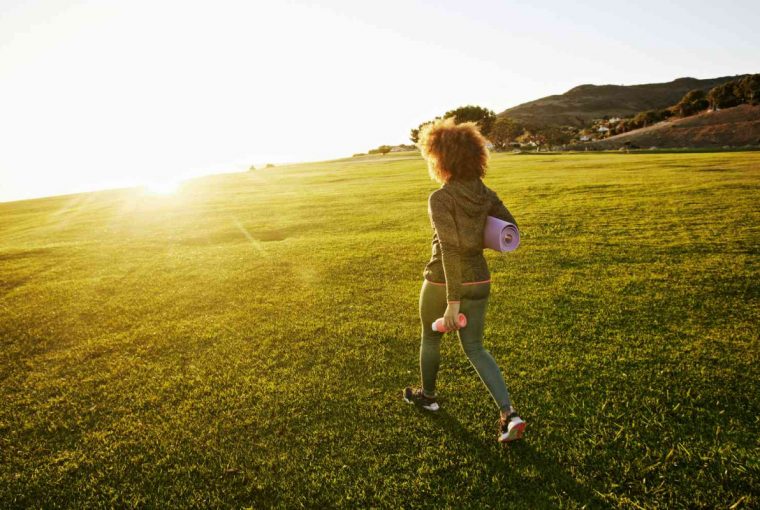 a woman walking outdoors