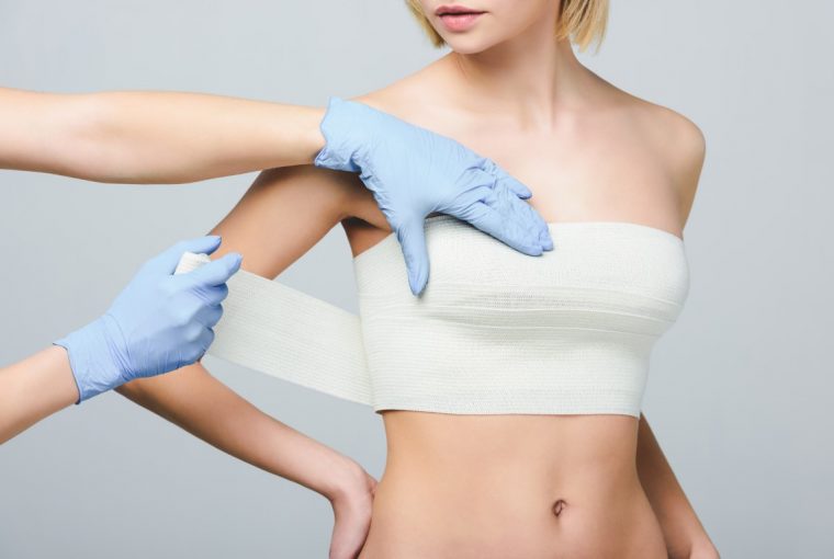 a woman after breast revision surgery